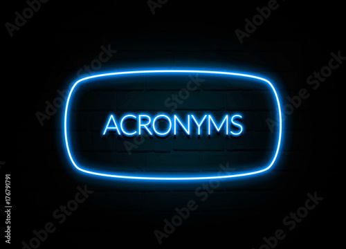 Acronyms - colorful Neon Sign on brickwall