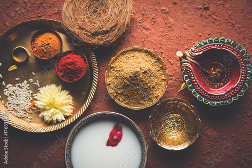 Abhyanga Snan on first day of Diwali - special herbal bath with ubtan or Utne, a mix herbal powder to have bath and scrub on the occasion of Diwali, selective focus