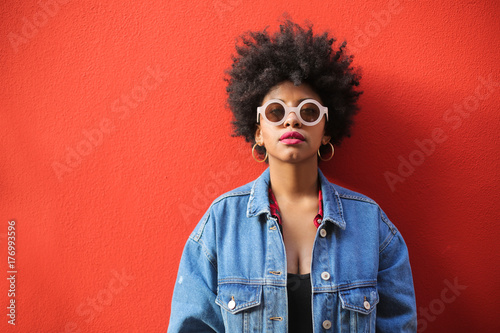 Fashionable girl wearing cool clothes and accessories