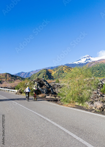 Cyclists on street to Volcano Etna