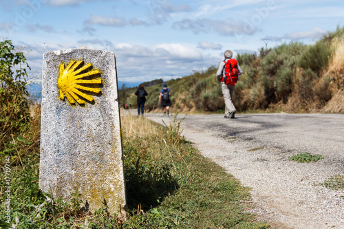 The yellow scallop shell signing the way to santiago de compostela on the st james pilgrimage route