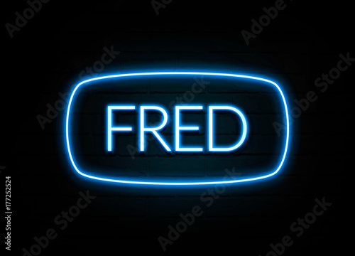 Fred - colorful Neon Sign on brickwall