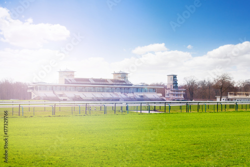 Chantilly racecourse with stands at sunny day