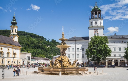 Residenz square church and fountain in Salzburg, Austria