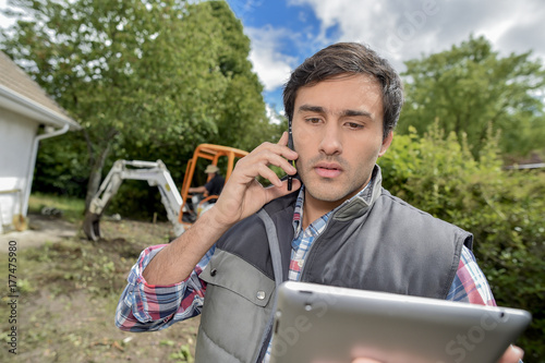 landscaper on the phone