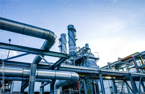 Industrial view at oil refinery plant form industry zone with cloudy sky 