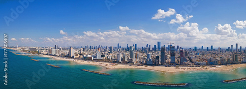 Tel Aviv skyline off the shore of the Mediterranean sea - Panoramic aerial image
