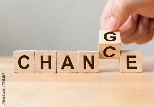 Hand flip wooden cube with word "change" to "chance", Personal development and career growth or change yourself concept