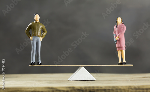 Balanced Scale With a Man and Woman