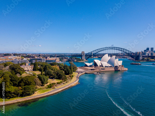Aerial Sydney view with the Opera house right by the Sydney harbour. Beautiful town. Australia.