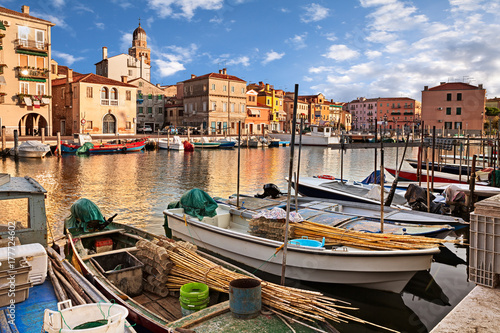 Chioggia, Venice, Italy: waterway in the old town with fishing boats