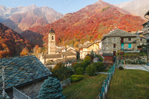 Piedicavallo, Italy - October 20, 2017: Rustic alpine village of Piedicavallo in the autumn season between the Italian Alps