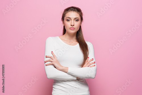 The young woman's portrait with proud and arrogant emotions