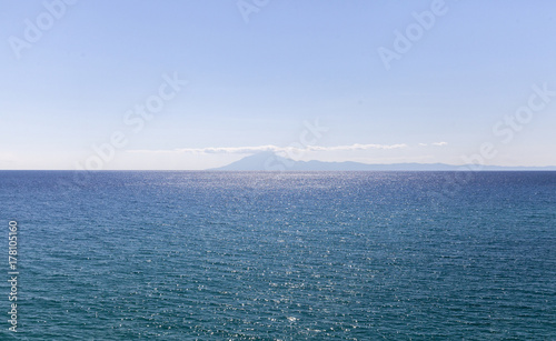 water surface with island Atos in Greece