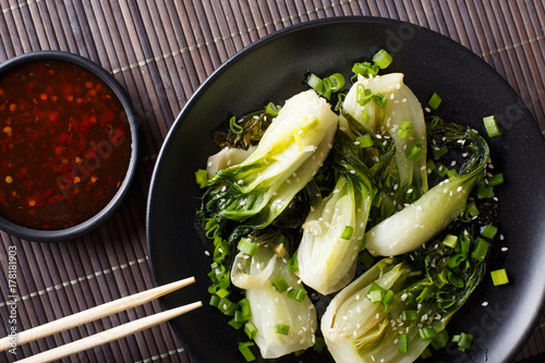 stir-fry spicy baby bok choy close-up. horizontal top view