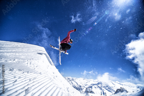 Expert skier showing freestyle trick