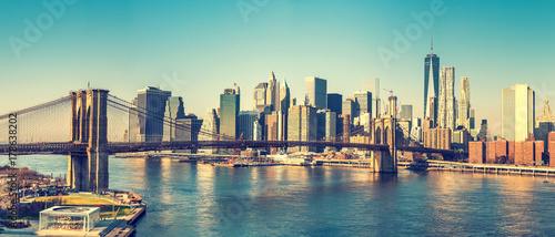 Brooklyn bridge and Manhattan at sunny day, New York City