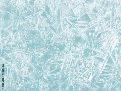 Ice texture with cracks. Winter, Christmas, New Year background.