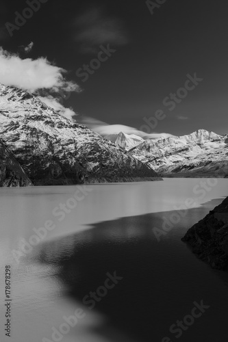 beautiful mountain landscape. Swiss alps with a Grande Dixence Dam black-and-white image landscape