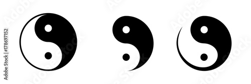 Vector set of black and white yin and yang symbols isolated on a white background.