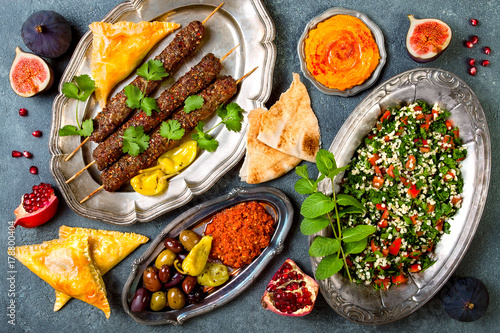 Middle Eastern traditional dinner. Authentic arab cuisine. Meze party food. Top view, flat lay, overhead