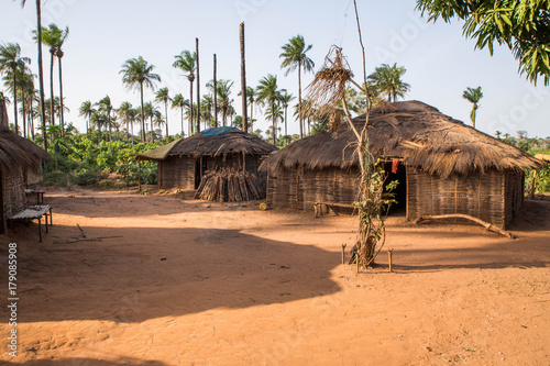 West africa Guinea Bissau - West africa Guinea Bissau Bijagos Islands - a traditional African village, houses with palm leave