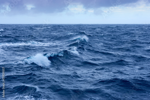 Clouds, waves and ship trace in Pacific