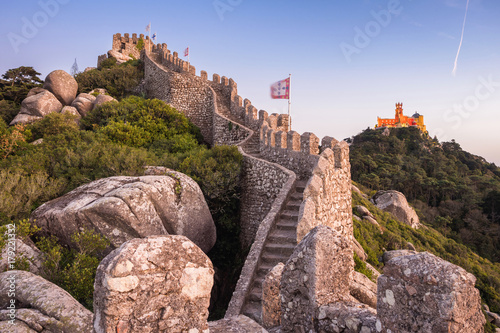 Moorish Castle and Pena Palace at sunset in Sintra, Portugal.