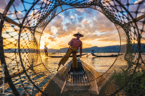 Intha fishermen at sunset, Inle Lake, Myanmar