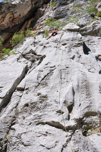 A rock climber on a wall.