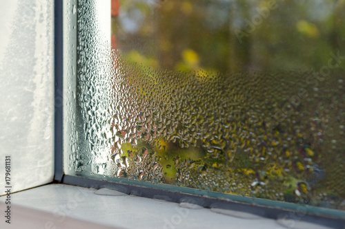 window with water drops closeup, inside, selective focus