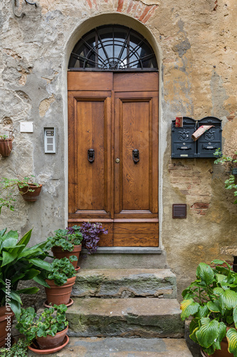 Massive wooden doors typical of southern Italy