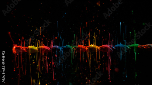 Rainbow linear paint splatter background