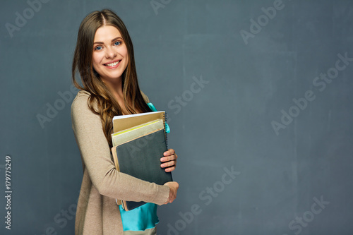 Smiling girl student or woman teacher portrait