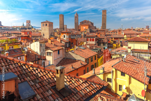 Aerial view of Bologna Cathedral and towers towering above of the roofs of Old Town in medieval city Bologna in the sunny day, Emilia-Romagna, Italy