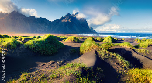 Black sand dunes on the Stokksnes headland on southeastern Icelandic coast with Vestrahorn (Batman Mountain)
