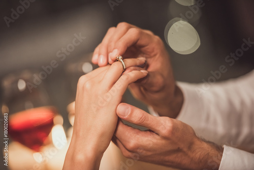 Man proposing in restaurant