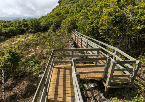 View of track with wooden fences over Fumaroles, Furnas de Enxofre, Terceira, Azores, Portugal.