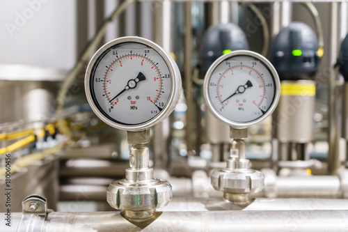 Pressure gauge, measuring instrument close up on pneumatic control system.