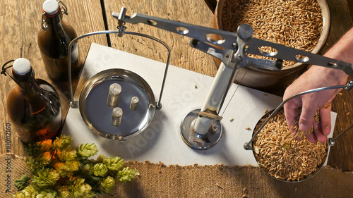 Man Weighs Malt for Home Brewing of Beer.