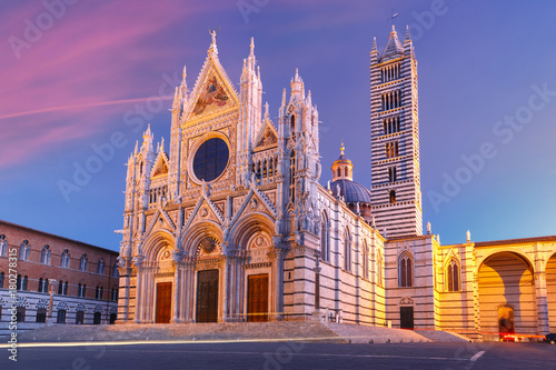 Beautiful view of facade and campanile of Siena Cathedral, Duomo di Siena at sunrise, Siena, Tuscany, Italy