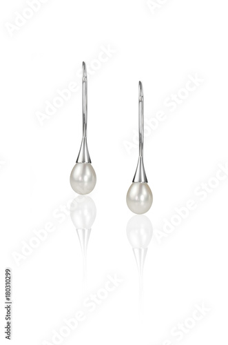 Silver drop pearl earrings modern styling isolated on white