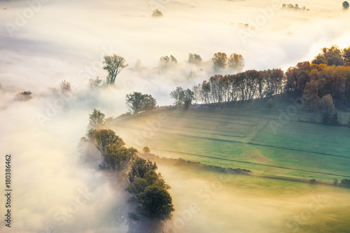 View of the Adda river valley during a foggy morning, Airuno, Italy