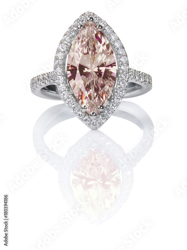 Peach Pink Morganite Beautiful Diamond Engagment ring. Gemstone Marquise cut surrounded by a halo of diamonds.