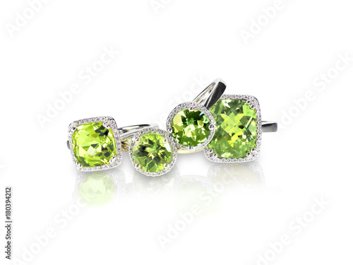Set of green peridot diamond rings gemstone fine jewelry. Group stack or cluster of multiple gemstone diamond rings.