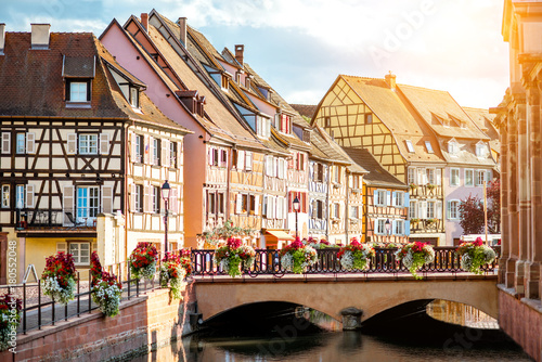 Landscape view on the beautiful colorful buildings on the water channel in the famous tourist town Colmar in Alsace region, France