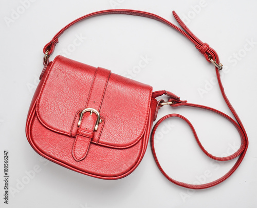 Red leather bag on a white background. Top view.