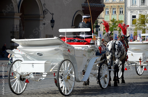 Cab on the main square - old town in Krakow, Poland