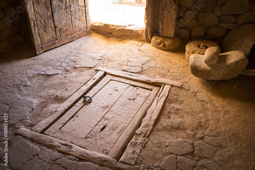 ancient wooden closed trapdoor in a rustic house