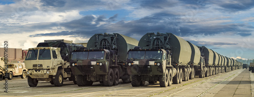 column of vehicles of the American army on the way to Central and Eastern Europe